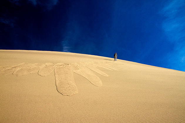 Climbing a sand dune