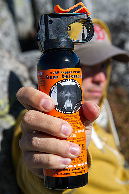 Man holding bear spray