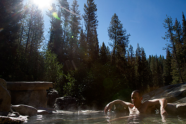 Hot man in hot spring in Idaho