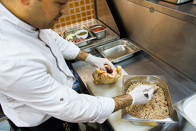 stuffing a chicken