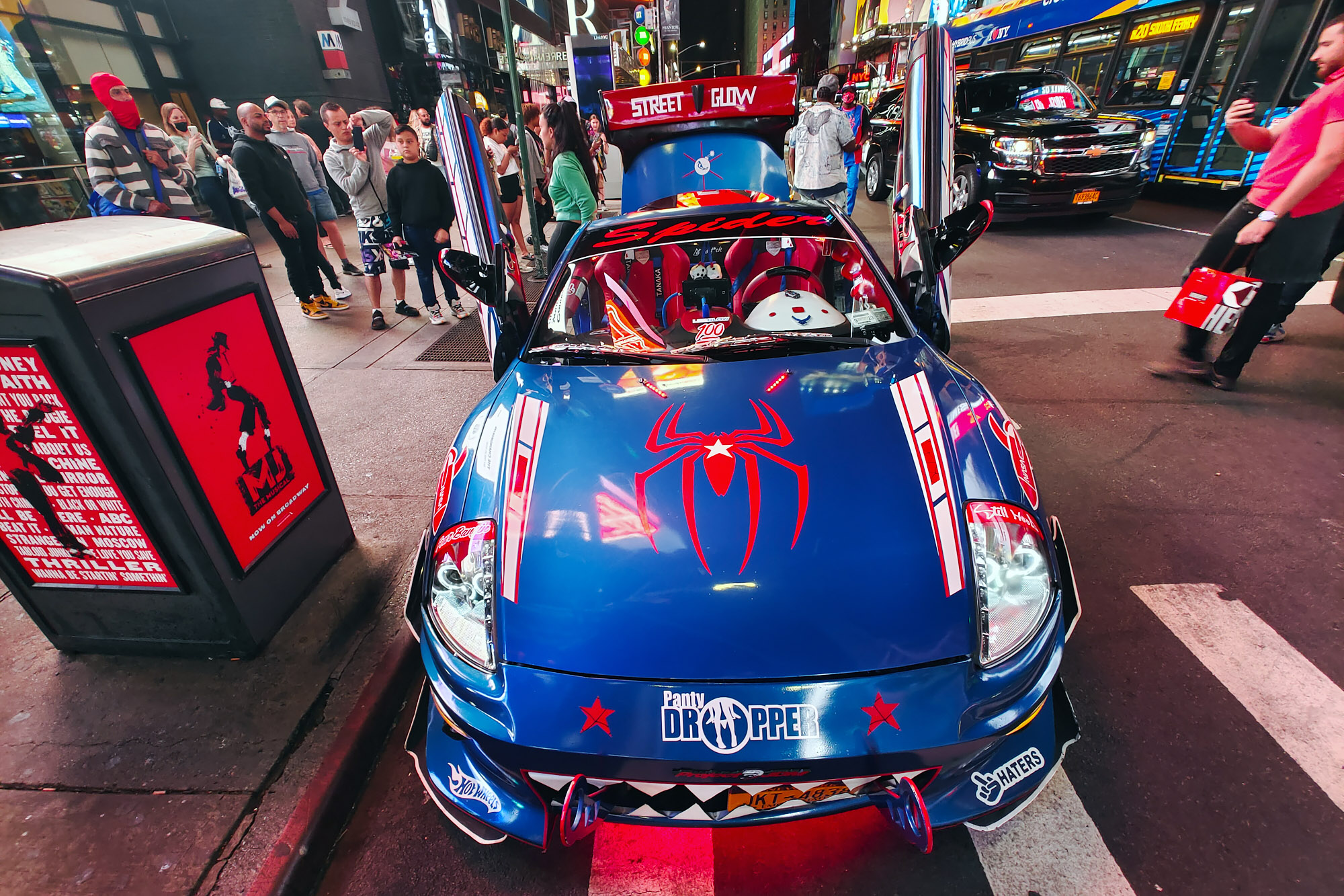 Low light mobile phone photo of a spider car in at Times Square vivo x60 pro plus