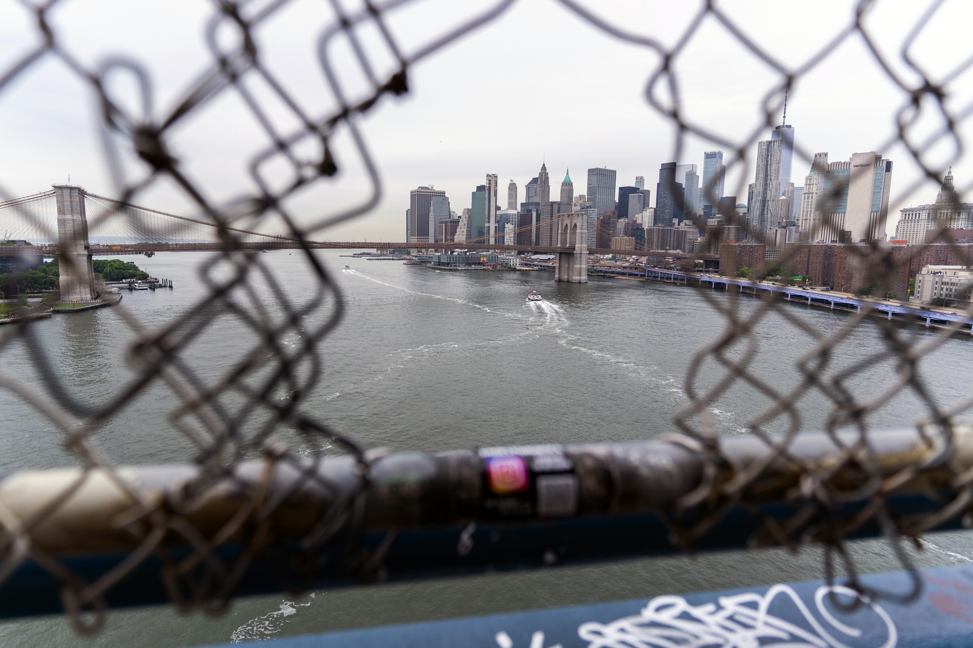 Hole in the fence Manhattan Bridge
