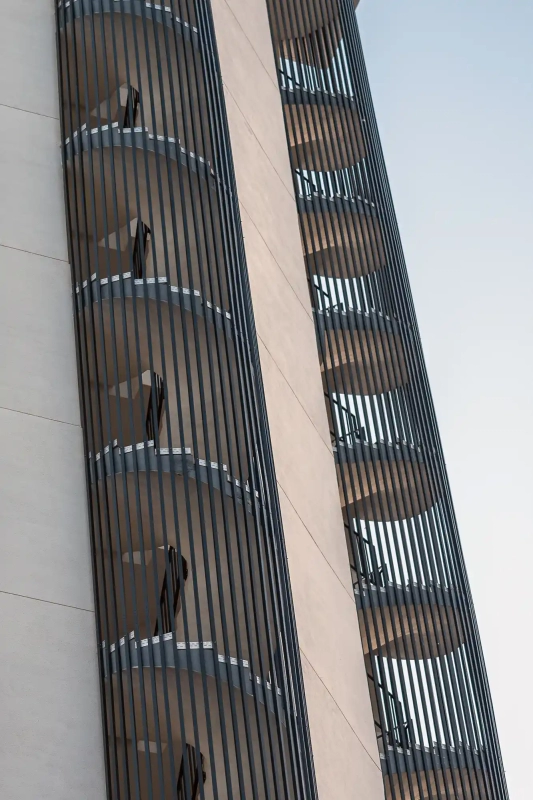 Spiral staircase on outside of skyscraper