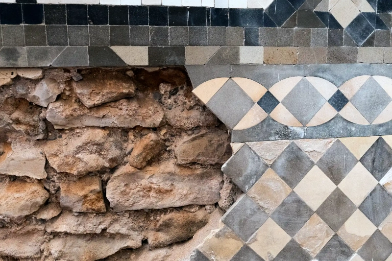 Broken tiles covering Brick