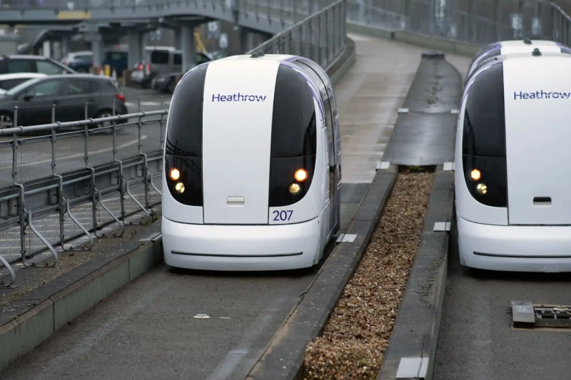 Two self driving pods at Heathrow